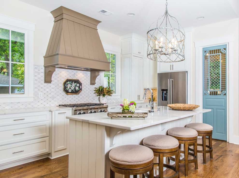 Transitional Kitchen Island with Taupe Range Hood & Beadboard Paneling
