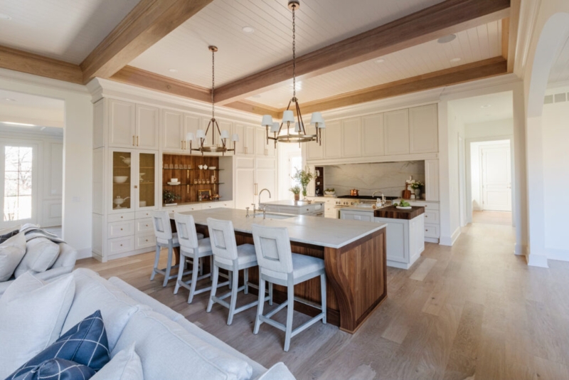 Transitional Kitchen with Walnut Ceiling Beams and Wood Accent Island