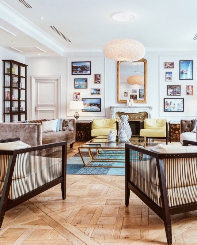 Transitional Living Room Gallery Wall with Parquet Flooring