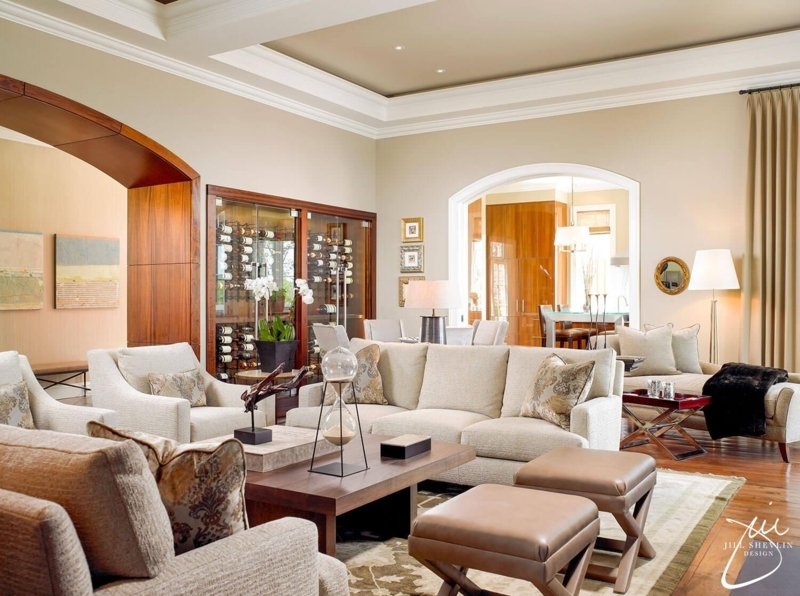 Transitional Living Room with Built-in Wine Storage and Arched Doorway