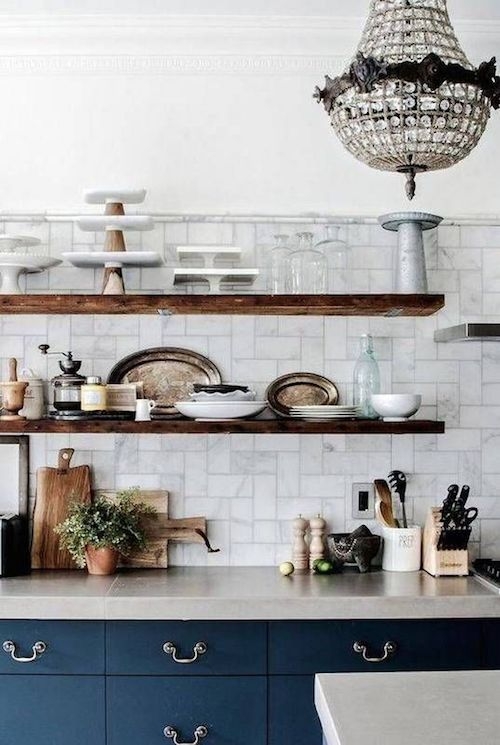Transitional Navy Blue Kitchen with Crystal Chandelier and Marble Tile