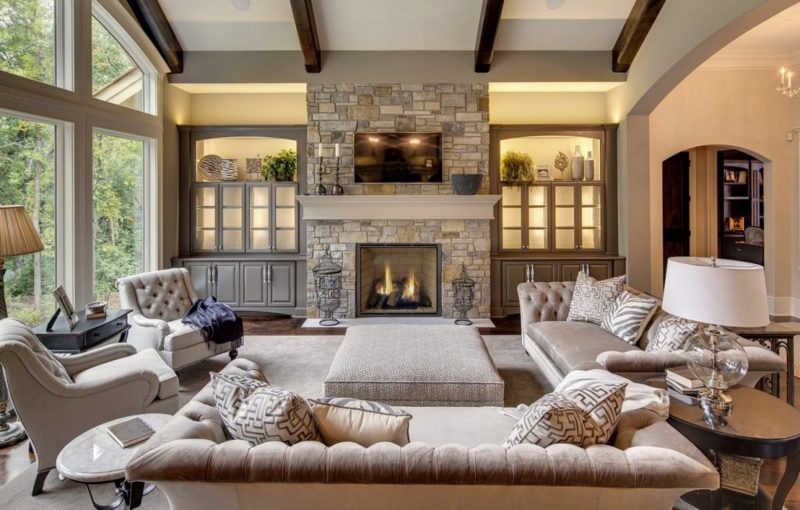 Transitional Rustic Living Room with Floor-to-Ceiling Stone Fireplace