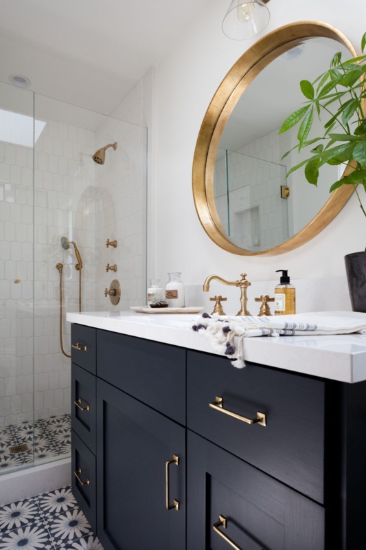 Transitional Vanity with Metallic Hardware and Patterned Floor Tiles