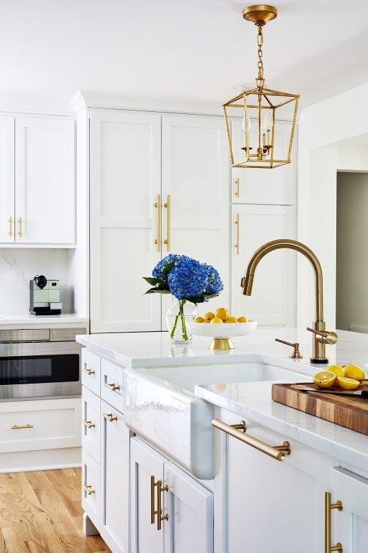 Transitional White Kitchen with Farmhouse Sink and Gold Gooseneck Faucet