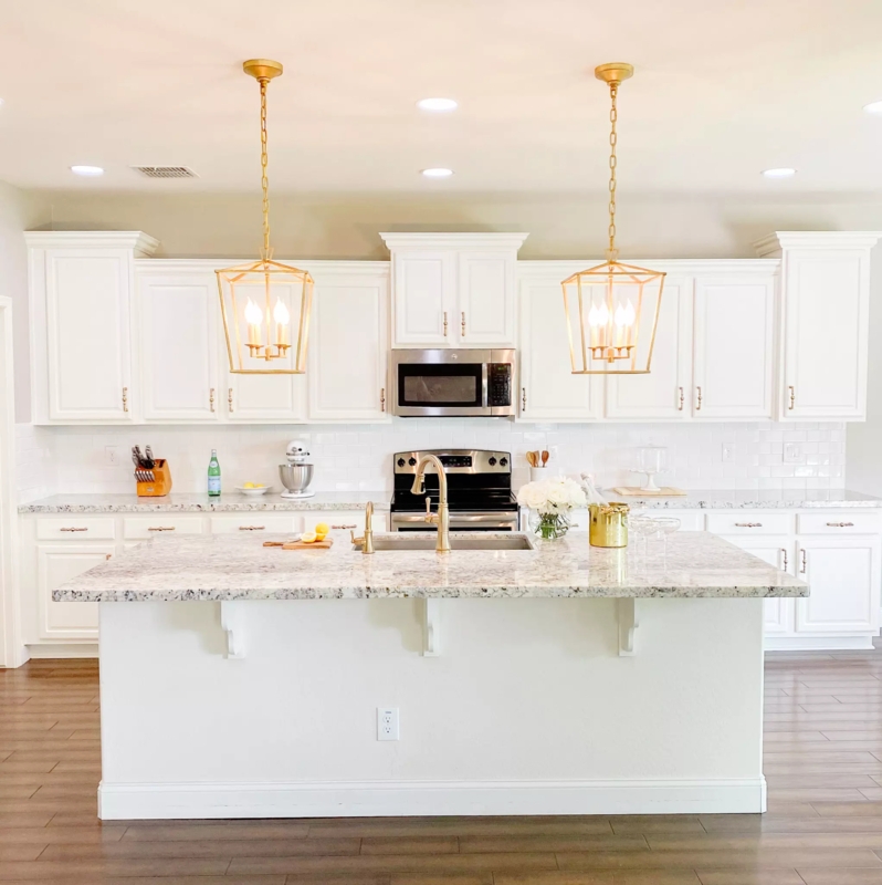 Transitional White Kitchen with Gold Lantern Pendants and Shaker Style