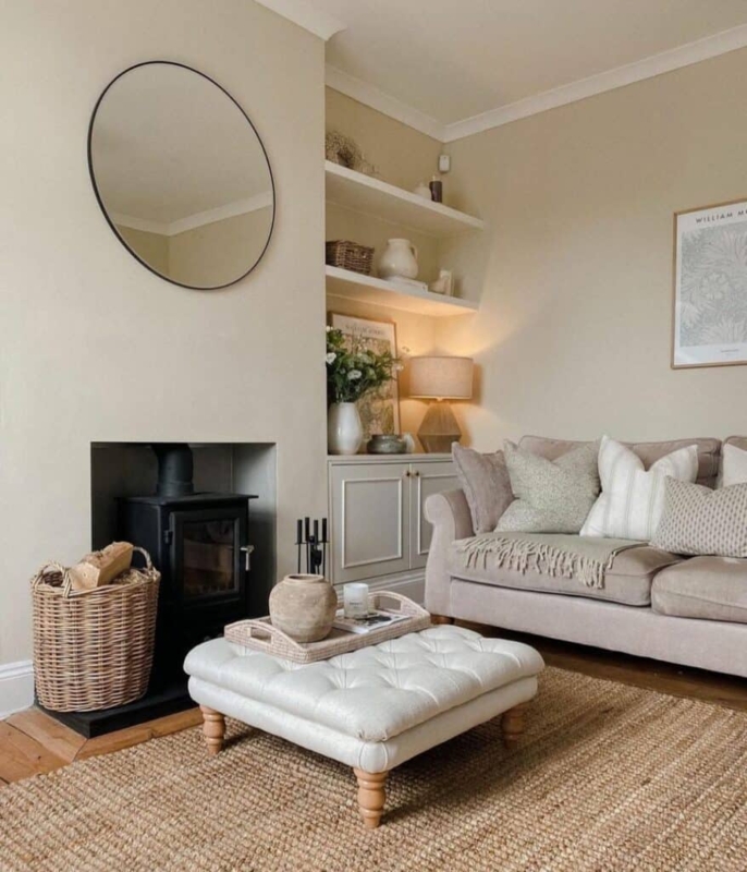 Tufted Ottoman Coffee Table with Black Wood Burner and Jute Rug