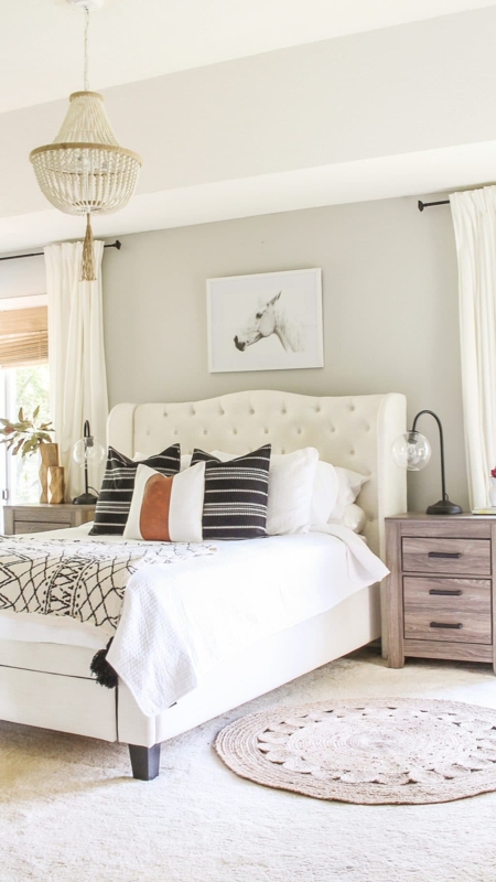 Tufted Wingback Bed in Neutral Bedroom with High Contrast Pillows