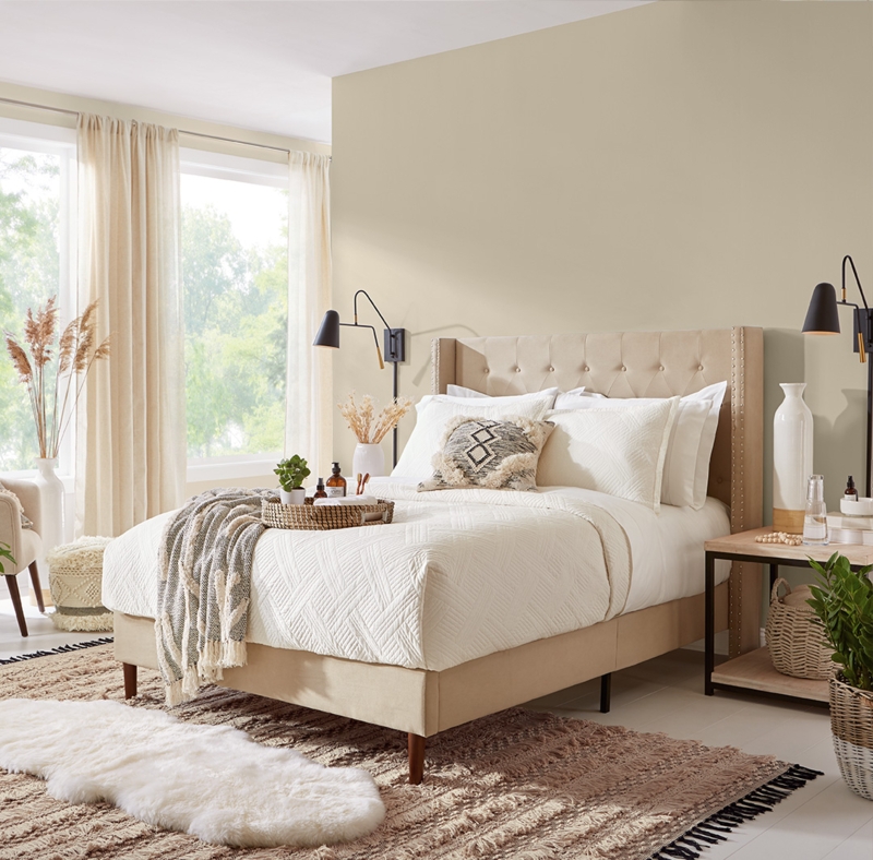 Tufted Wingback Bed with Black Swing Arm Sconces