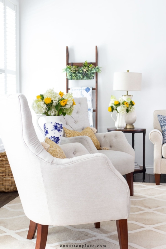 Tufted Wingback Chairs: Cream Upholstery in a Neutral Living Room