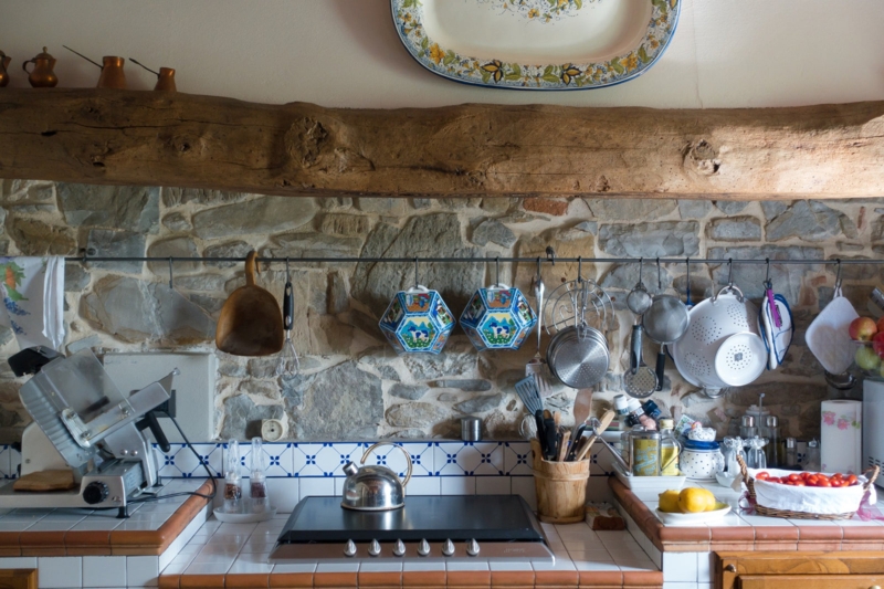 Tuscan Workspace: Reclaimed Timber Mantel & Stone Backsplash | Rustic