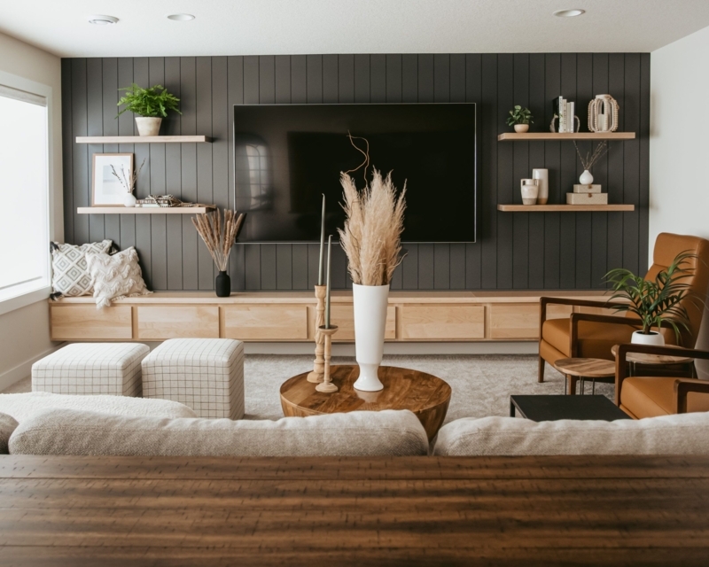 TV Accent Wall Light Wood Floating Shelves on Black Slat Paneling