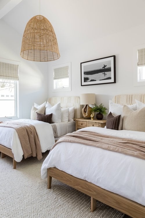 Twin Beds featuring Oversized Woven Pendant in Coastal Layout