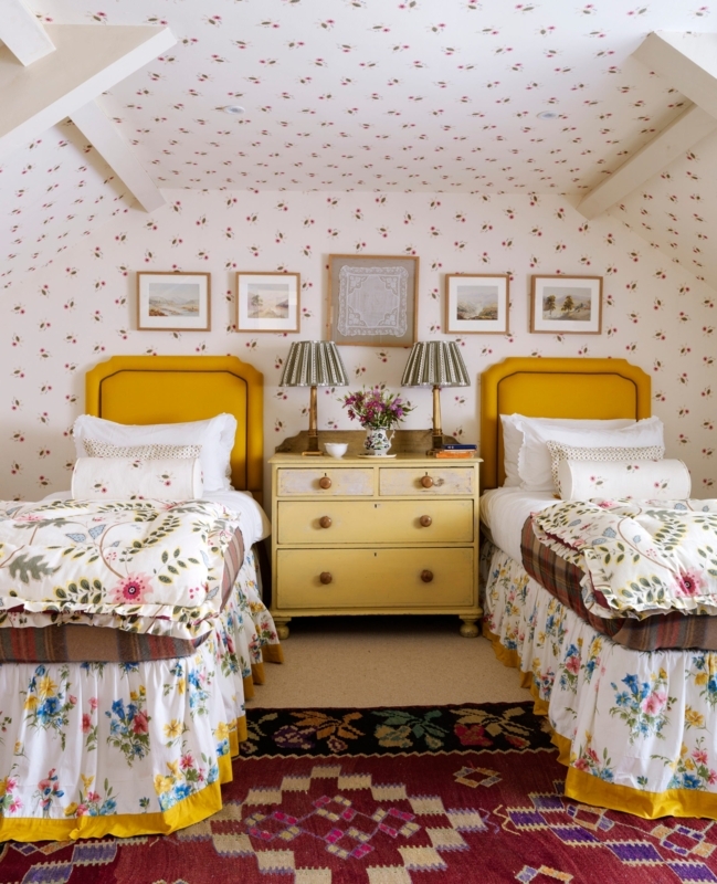 Twin Beds with Mustard Yellow Headboards in Floral Attic Room