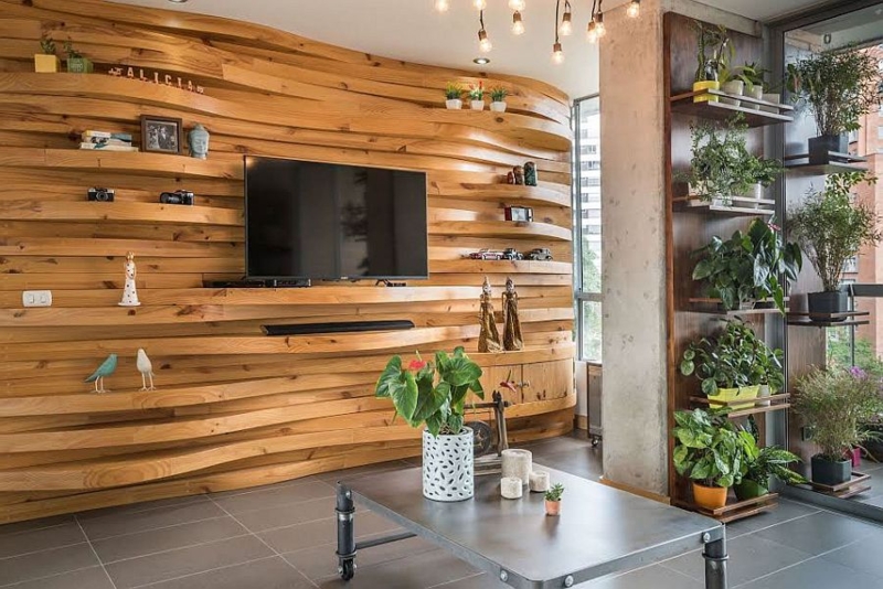Undulating 3D Wood Slat Wall Paneling with Integrated Shelving