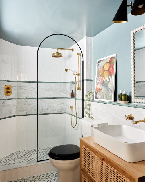 Unique Small Bathroom with Blue Ceiling and Black Arched Shower Screen