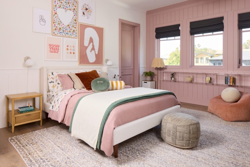 Upholstered Bed against Dusty Rose Paneling with Acrylic Shelves