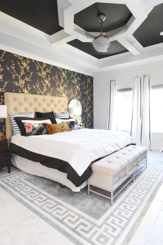 Upholstered Bed in Glam Bedroom with Black and Gold Bird Wallpaper
