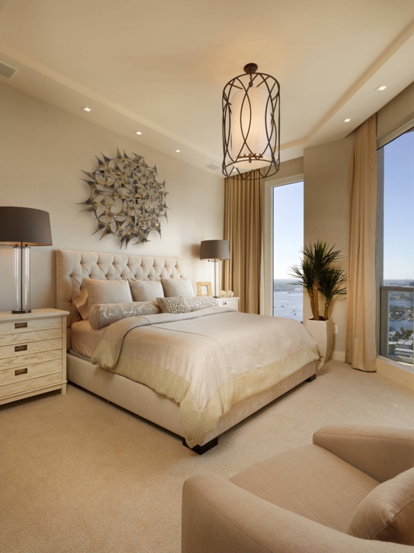 Upholstered Bed with Button Tufted Headboard and Metallic Sunburst Art