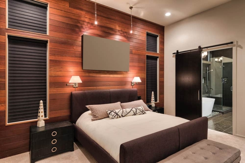 Upholstered Bed with Horizontal Wood Plank Wall and Sliding Barn Door