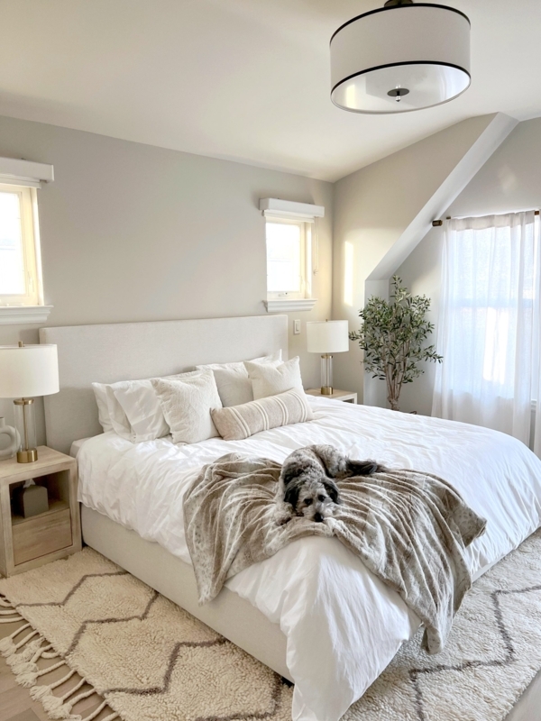 Upholstered Bed with Textured Diamond Rug in Minimalist Bedroom