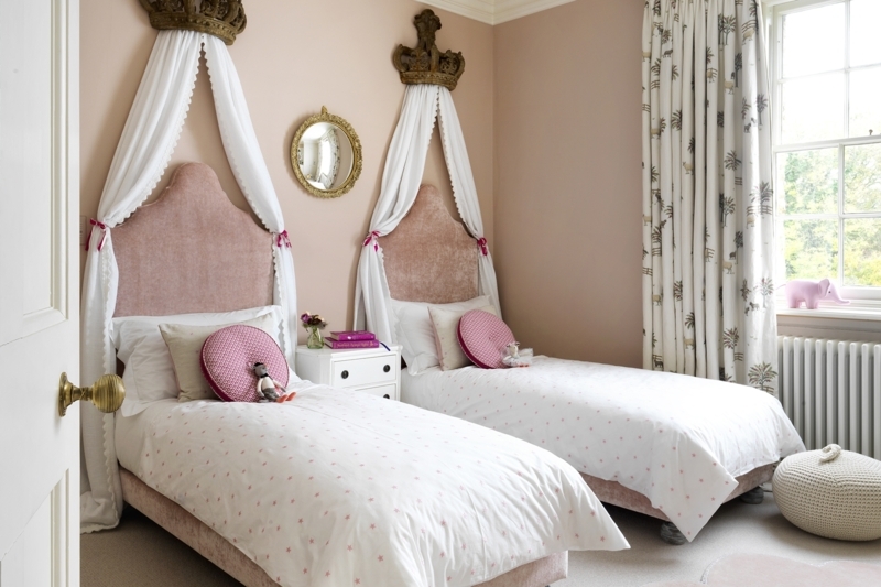 Upholstered Pink Twin Beds with Bed Crown Canopies