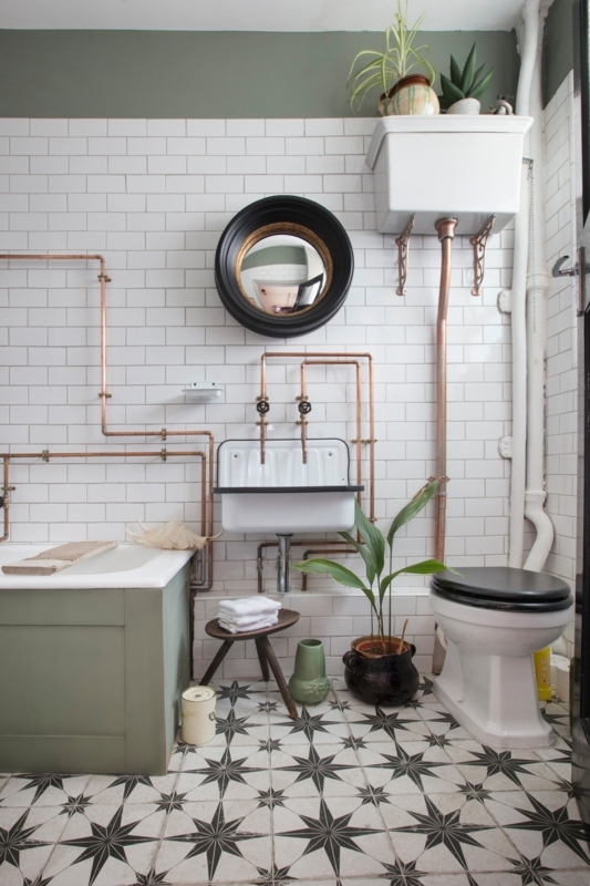 Utility Sink with Exposed Copper Pipes and Star Patterned Floor