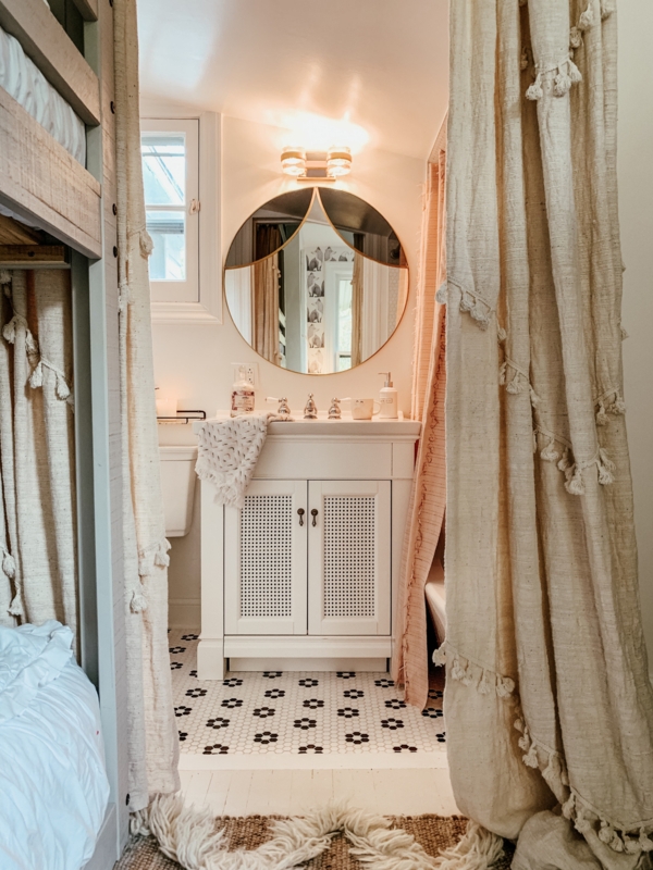 Vanity Cabinet with Mesh Doors and Floral Penny Tile Flooring