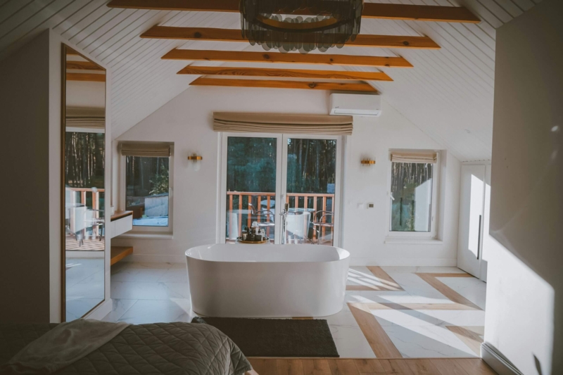 Vaulted Ceiling with Exposed Beams in Attic Suite