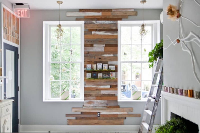 Vertical Reclaimed Wood Wall Installation with Symmetrical Windows