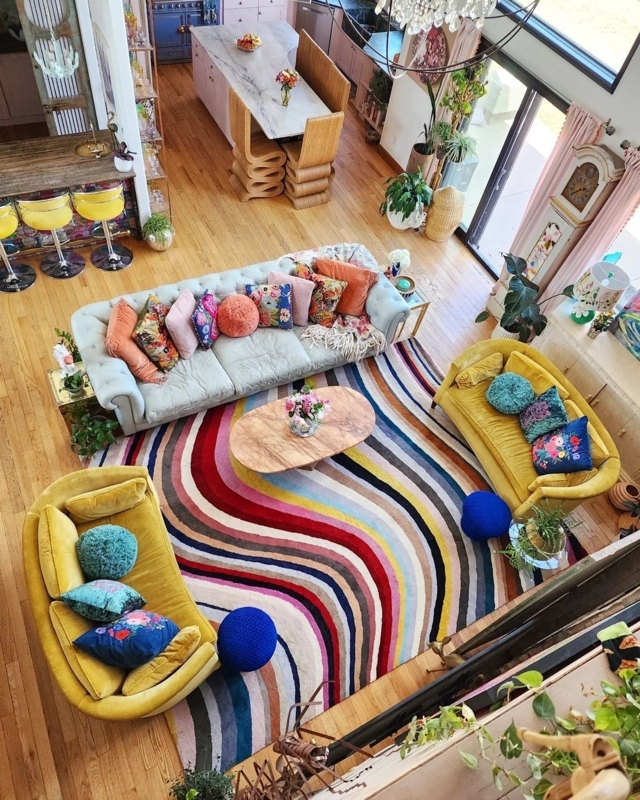 Vibrant Maximalist Living Room with Wavy Striped Rug