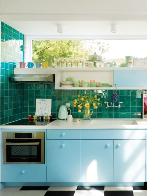 Vibrant Teal Tile Backsplash with Checkered Floor and Open Shelving