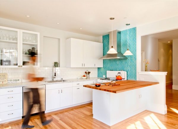 Vibrant Turquoise Kitchen Accent Wall and Butcher Block Island