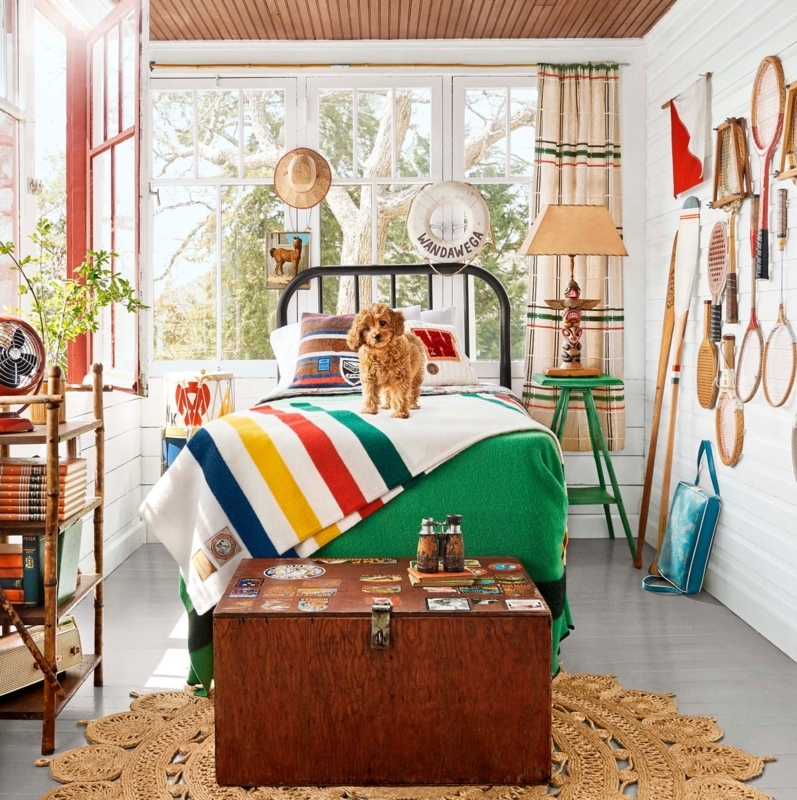 Vintage Sports Equipment Wall Art in Rustic Camp-Themed Bedroom