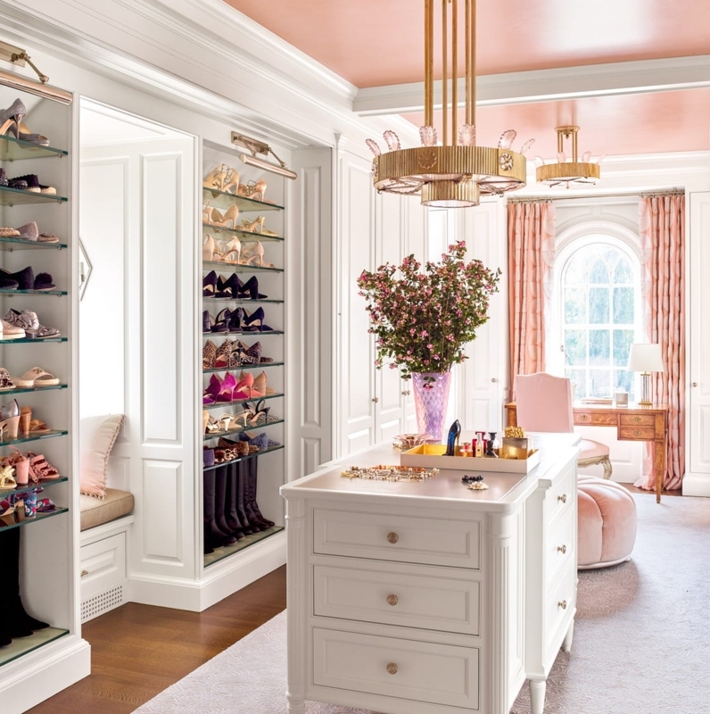 Walk In Closet with Blush Pink Ceiling and Tiered Gold Chandelier