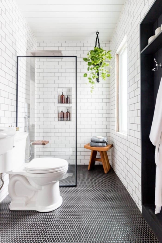 Walk-in Shower with Black Penny Tile and Subway Tile Walls