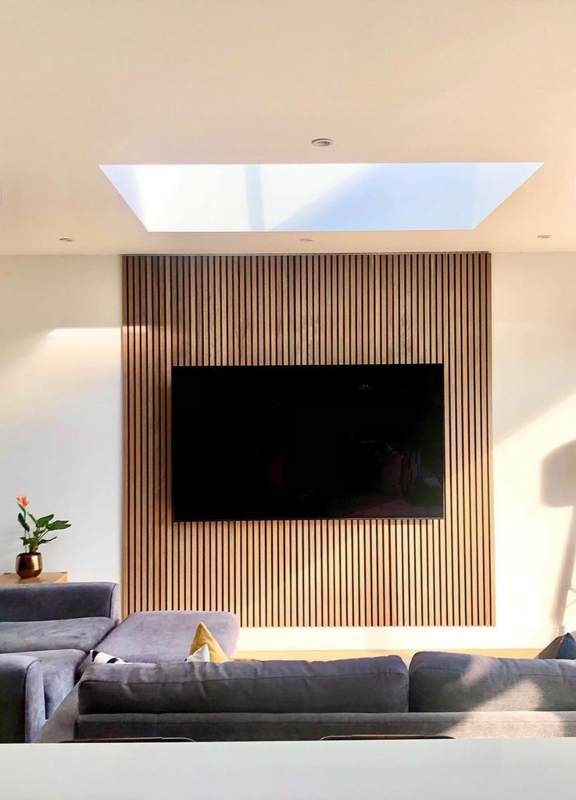 Wall Paneling Vertical Wood Slats beneath Skylight Placement