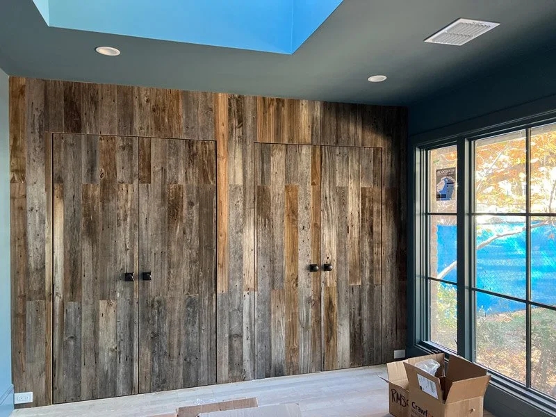 Wall Paneling: Weathered Grey Reclaimed Wood Boards with Visible Knots