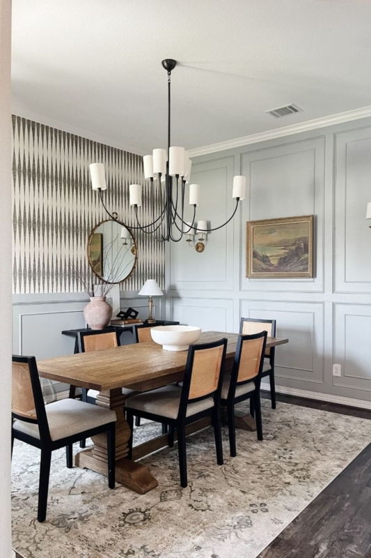 Wallpaper and Paneling Accent Wall with Cane Back Dining Chairs
