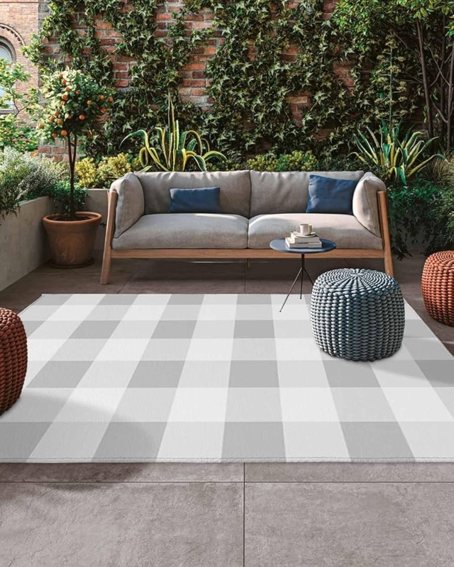Washable Outdoor Area Rug with Large Scale Black and White Check Pattern