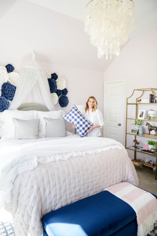 Whimsical Bed Canopy and 3D Floral Wall Decor in Navy Room