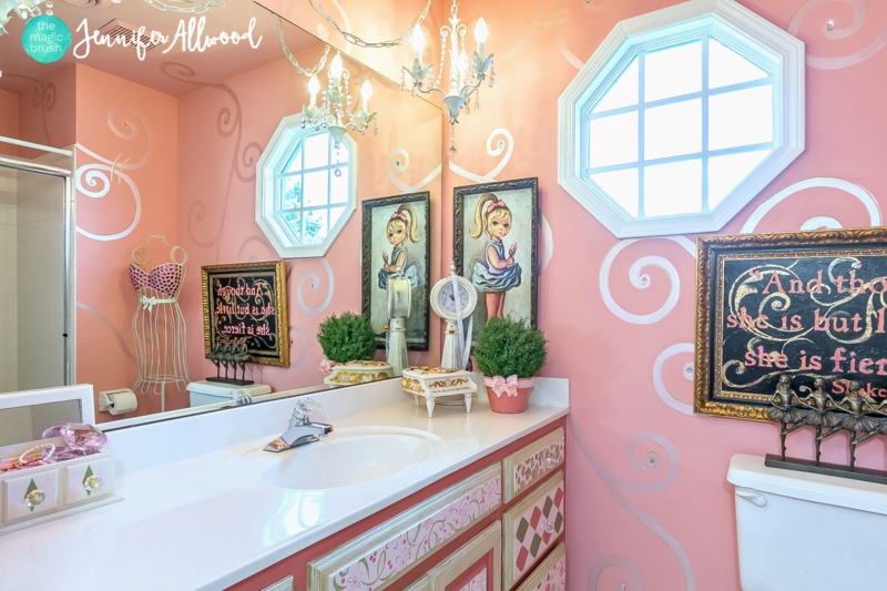 Whimsical Pink Bathroom with hand painted silver wall scrolls.