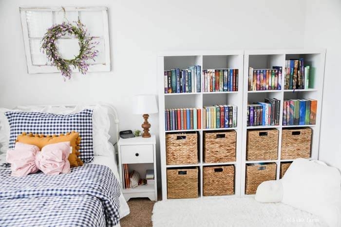 White Cube Shelving Units with Woven Baskets in Farmhouse Bedroom