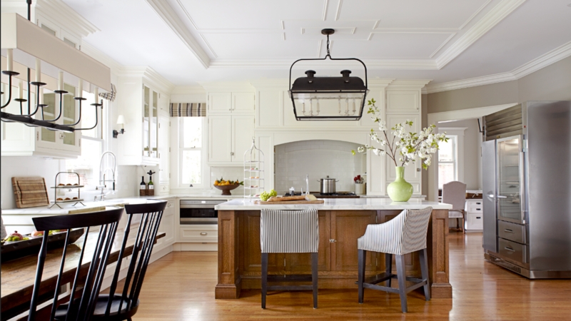 White Kitchen with Wood Island Contrast and Coffered Ceiling Detail