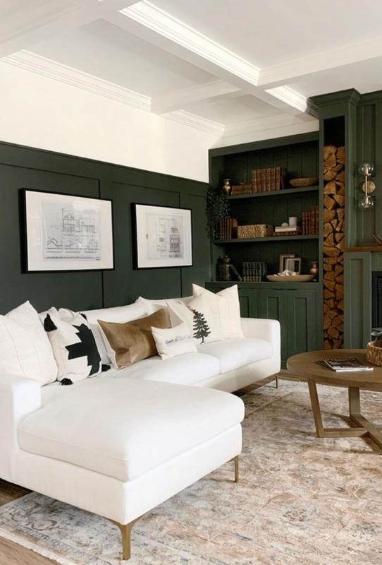 White Sectional Sofa in Living Room with Forest Green Wainscoting
