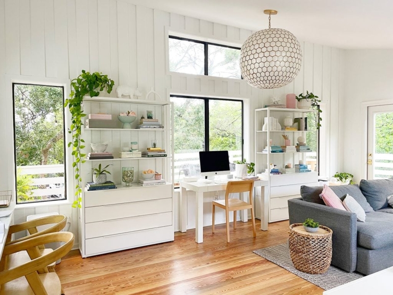 White Shelving Unit with Integrated Storage and Vertical Shiplap