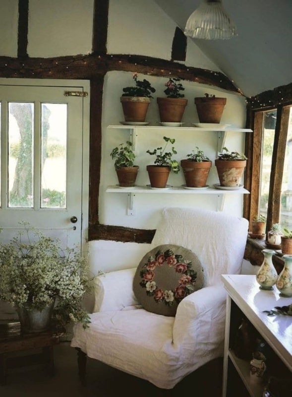 White Slipcovered Chair Styling in Cottagecore Nook with Plant Shelves