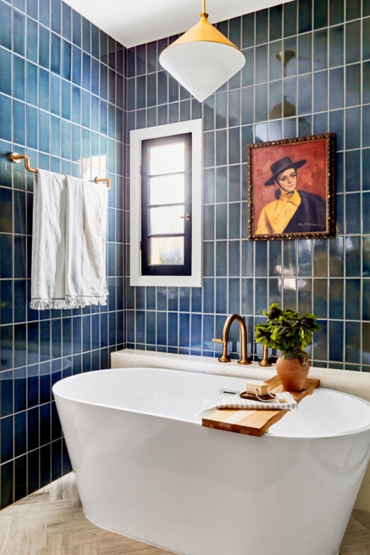 White Soaking Tub with Vertical Stack Tile Layout
