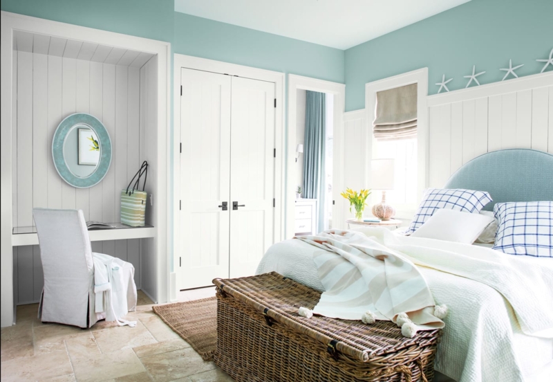Wicker Storage Trunk at Foot of Bed in Coastal Seafoam Bedroom