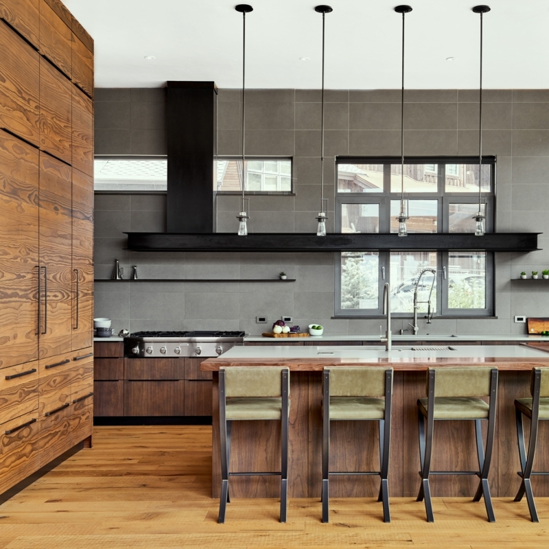 Wood Grain Pantry Cabinets: Charcoal Gray Tile Backsplash