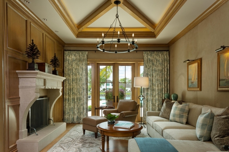 Wood Paneled Wall Fireplace Design with Beamed Tray Ceiling
